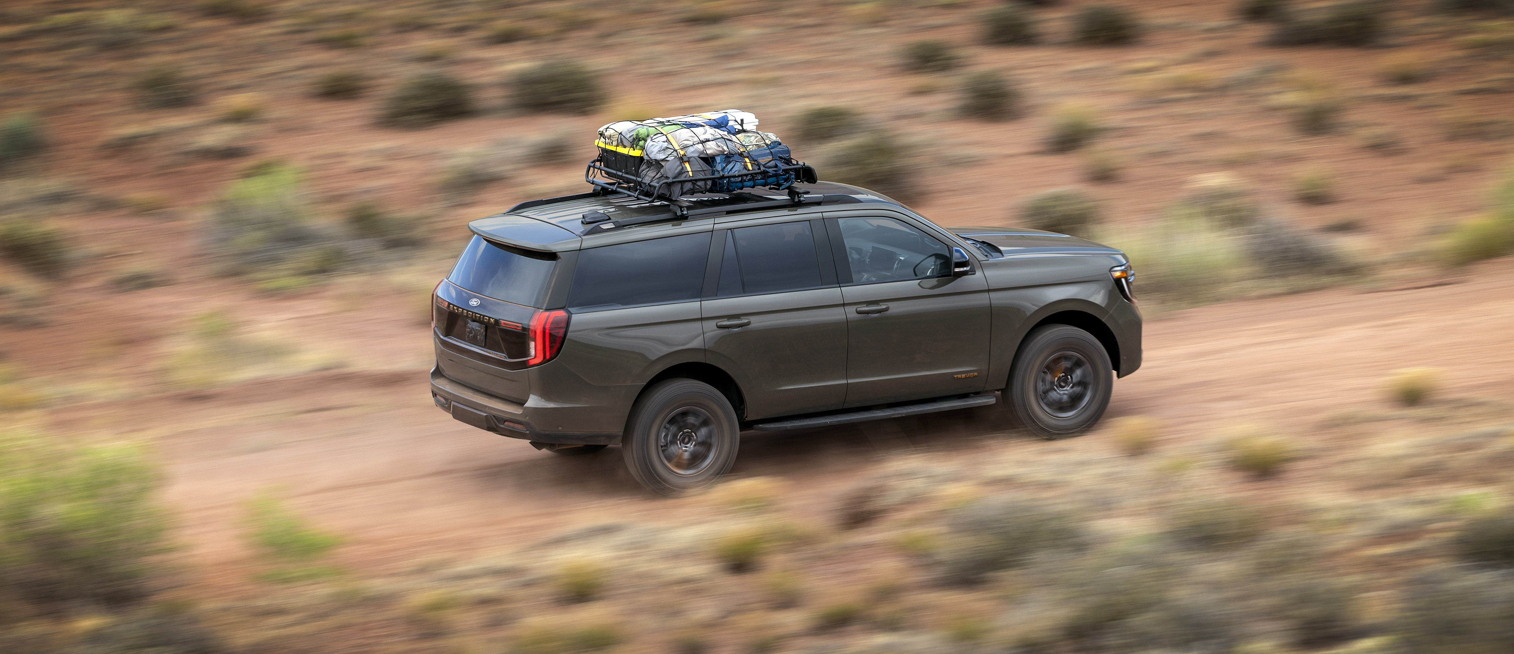 Always properly secure cargo. Available Ford and aftermarket accessories shown.